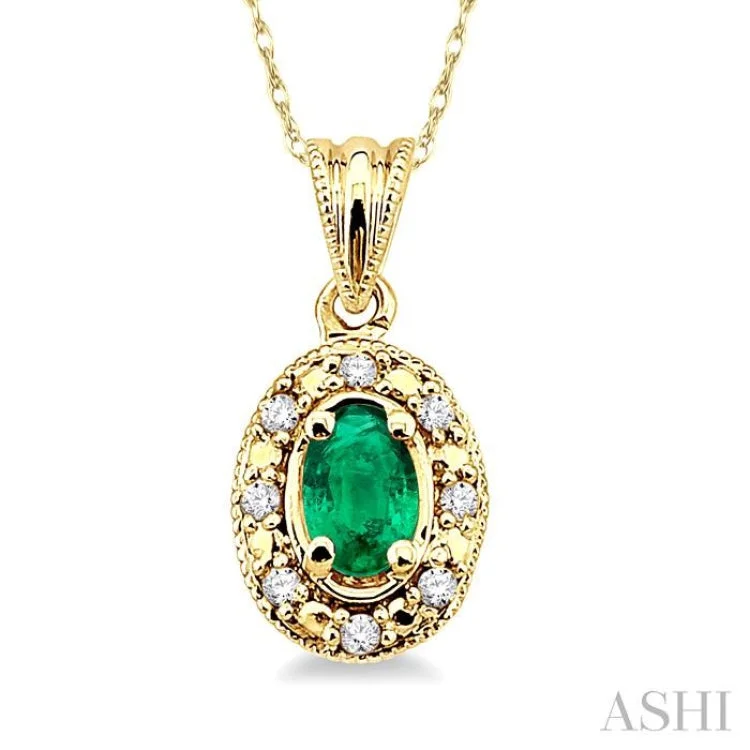 5x3mm Oval Shape Emerald and 1/20 Ctw Single Cut Diamond Pendant in 10K Yellow Gold with Chain. 5x3mm Oval Shape Emerald and 1/20 Ctw Single Cut Diamond Pendant in 10K Yellow Gold with Chain.